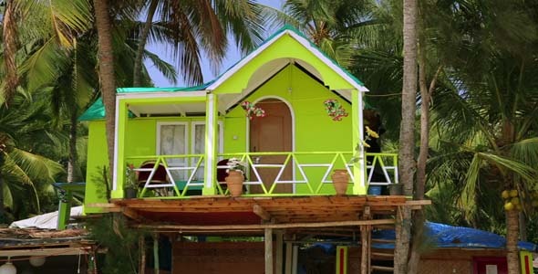 Colourful Bungalows In Resort On Sandy Beach