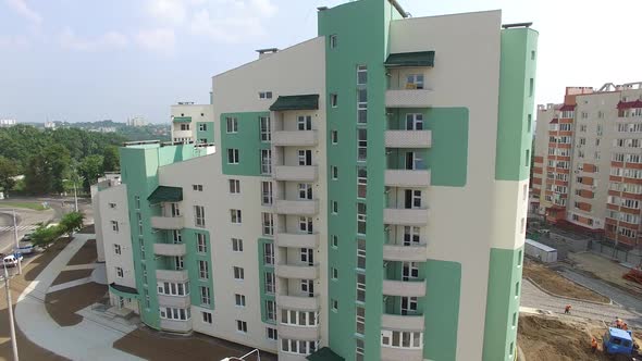 Panoramic view of white and green modern building with a new design in the city.