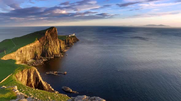 Stunning sunset at Neist point lighthouse, Scotland, United Kingdom