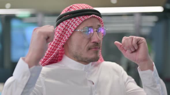 Middle Aged Arab Man Dancing