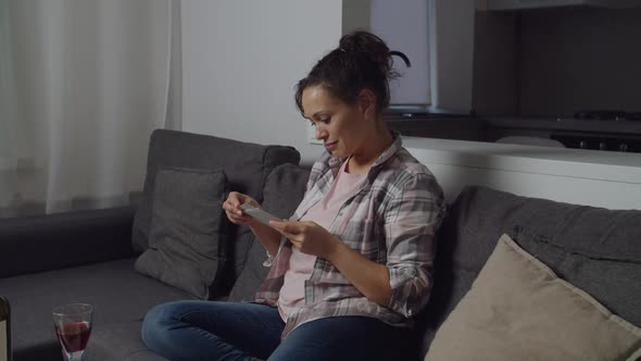 Unhappy Woman Feeling Heartbroken Breaking Up with Partner Indoors