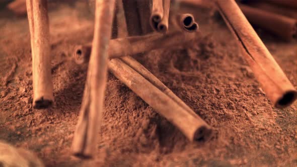 Super Slow Motion in a Pile on the Table Falling Cinnamon Sticks