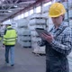 Worker Male Warehouse Worker Engineer Man in a Helmet Working on the Construction Site of the - VideoHive Item for Sale