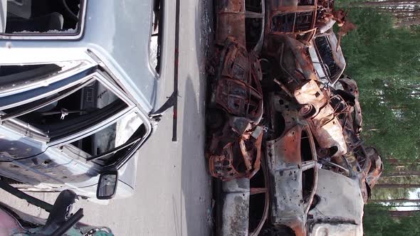 Vertical Video of a Dump of Cars Destroyed By the War in Ukraine