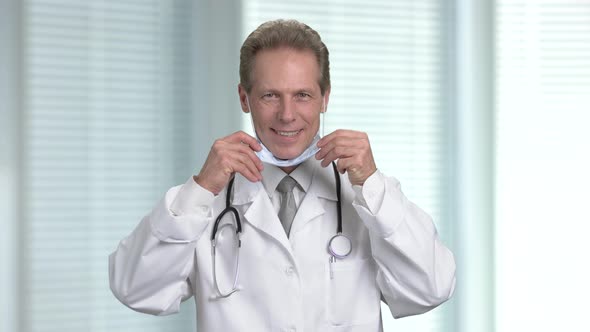 Male Doctor Uses the Stethoscope To Check Patient.