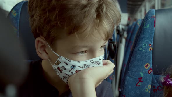 Caucasian boy in a mask