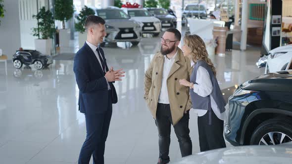 Sales Manager in a Car Dealership Serves a Married Couple