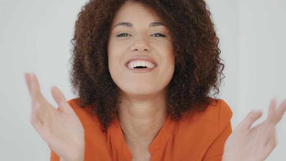 Portrait Closeup Enthusiastic Female Face Girl Shocked Lady with Curly Hair Woman Smiling Looking at