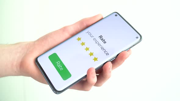 Man gives a five-star rating using a smartphone application