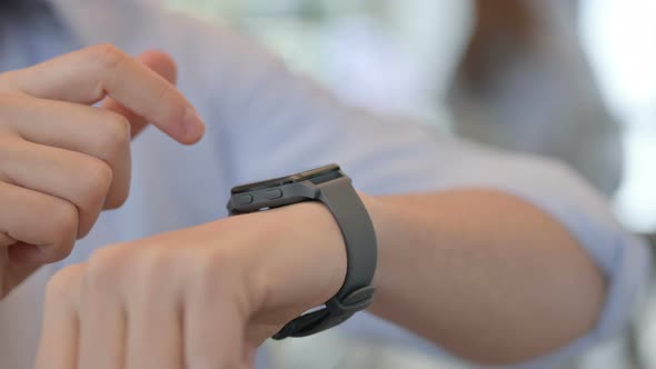 Close Up of Man Using Smartwatch