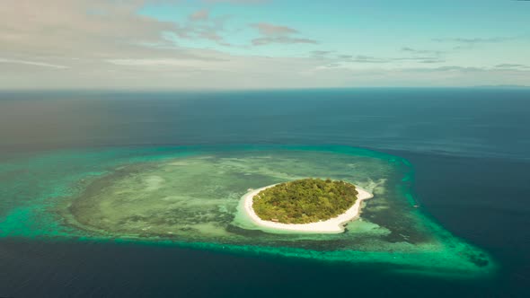 Tropical Island with Sandy Beach. Mantigue Island, Philippines