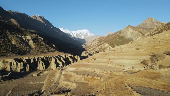 Aerial view of the terrace layers Manang looking through the valley