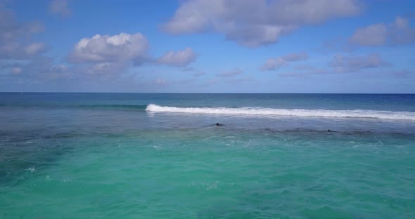 Beautiful aerial abstract view of a summer white paradise sand beach and blue sea background in colo