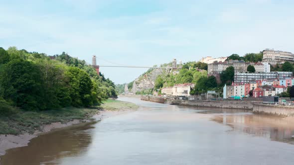 Low dolly forward drone shot towards Clifton suspension bridge Bristol