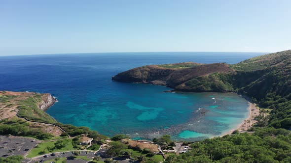 Aerial wide panning shot of Hanauma Bay Nature Preserve on the island of O'ahu, Hawaii. 4K