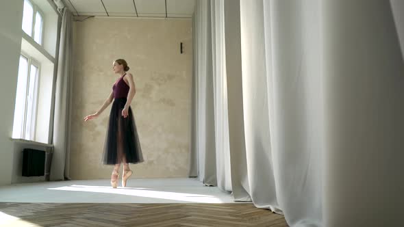 Pretty Ballet Dancer Does Dance Steps in the Stage Costume, Dance Studio Lesson. Shot in the Early