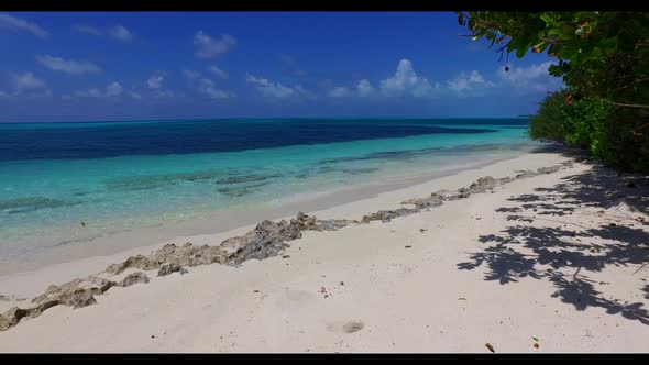 Aerial view sky of perfect island beach adventure by shallow lagoon with clean sand background of ad