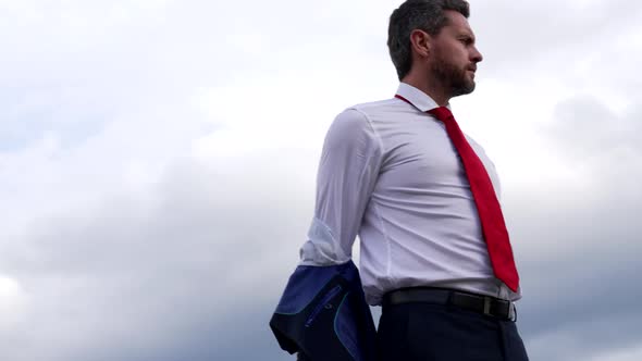 Confident Bearded Boss Taking Off Jacket on Sky Background Office Fashion