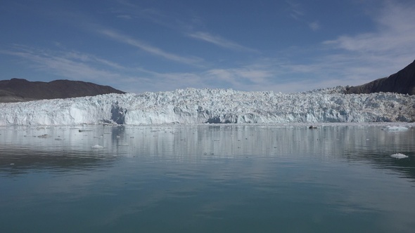 Climate change. Melting glaciers and icebergs in the ocean. Unesco World Heritage Site.