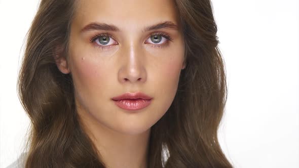 Natural Female Beauty Close-up with Perfect Curly Hair