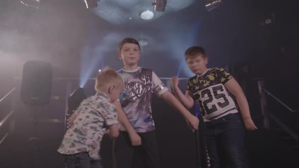 Three Young Boys Dancing Happily at a Disco / Party - Ungraded