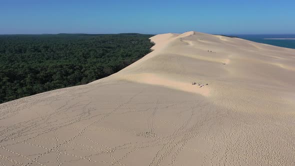Dune of Pilat in the Arcachon Bassin France at Cap Ferret with a height of 110meters and people walk