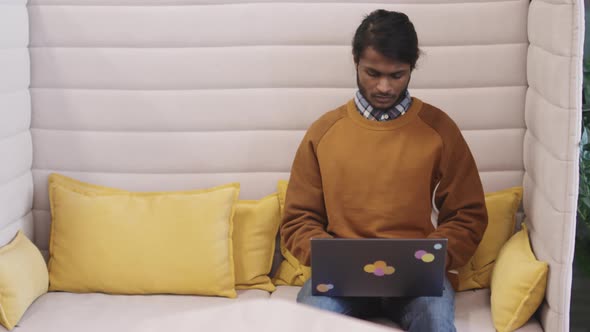 Indian Businessman Working on Laptop