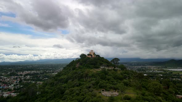 Take of in church over mountain in mexico