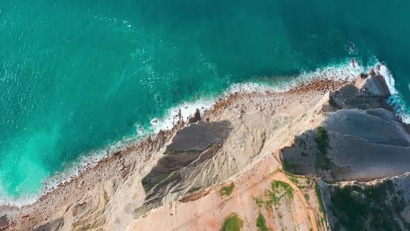 Aerial View Seascape with Waves on Rocky Coast