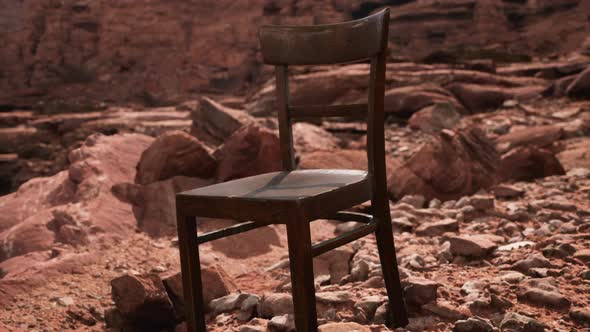 Old Wooden Chair on Rocks of Grand Canyon