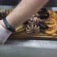 Man Puts Grilled Orange on Board with Sea Delicacies Closeup - VideoHive Item for Sale