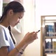 Asian teenager student using smart phone in school library. - VideoHive Item for Sale