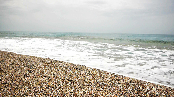 Sea Surf on a Sand Beach