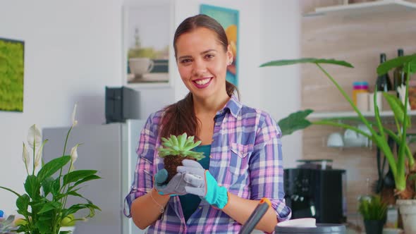 Smiling and Holding Flower