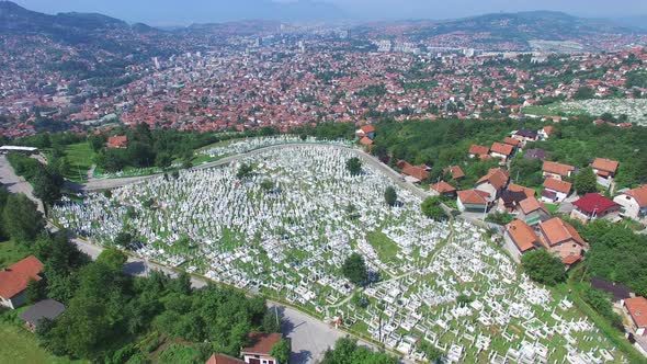 Flying over Bosnian town with Muslim graveyards