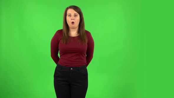 Pretty Girl Listening Information Then Shocked and Very Upset. Green Screen