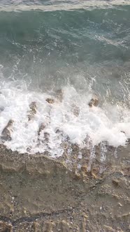 Vertical Video of Sea Water Near the Seashore Slow Motion