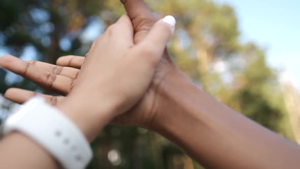 White Hand and Black Hand Connect. Friendship of Peoples, Brotherhood. Stop Racism, All People Are