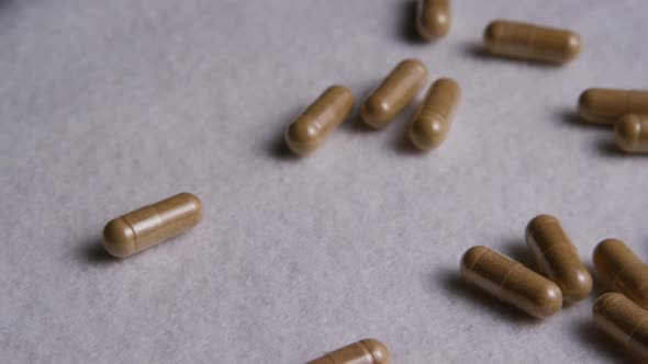 Rotating stock footage shot of vitamins and pills - VITAMINS 0034