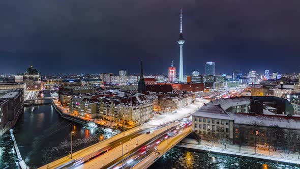 Snowy Night Time Lapse of Berlin Cityscape with TV Tower and Spree River, Berlin, Germany