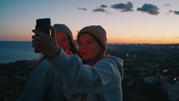 Two Young Millennial Friends Taking Video Selfie