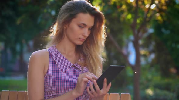 A Woman Using a Phone