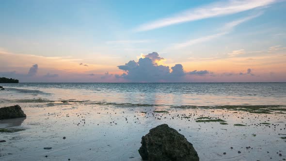 Time lapse tropical beach and sea at sunset, Colorful dramatic sky at dusk