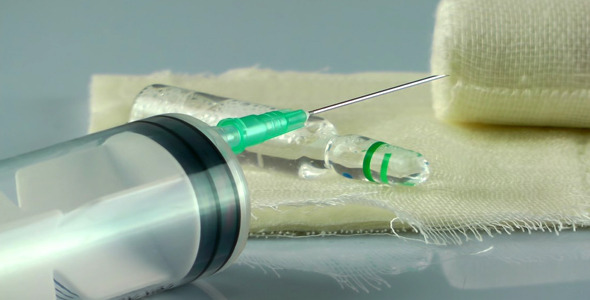 Injector Needle and Medicine on Gauze Bandage 2