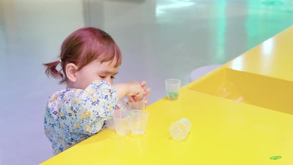 Curious Little Girl Playing At Gyeonggi Children's Museum In South Korea - medium shot