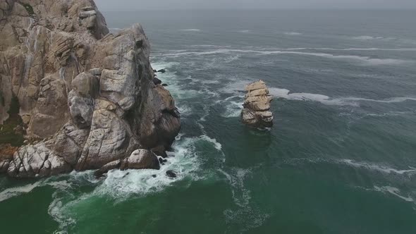 4K Aerial view of Morro Rock and Morro Bay in California USA