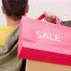 Black Friday Video Footage - Backside Of A Man Carrying Shopping Bagswh - VideoHive Item for Sale