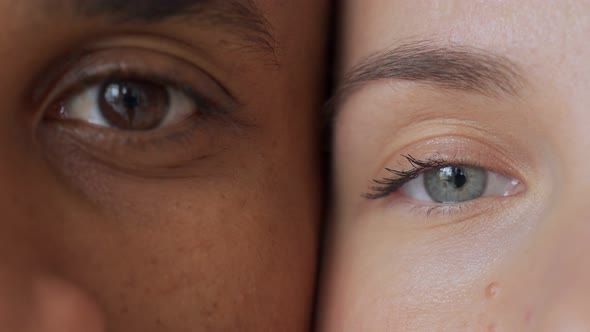 Black Man and White Woman's eyes.Interracial Race Love Concept. Anti-racism. 
