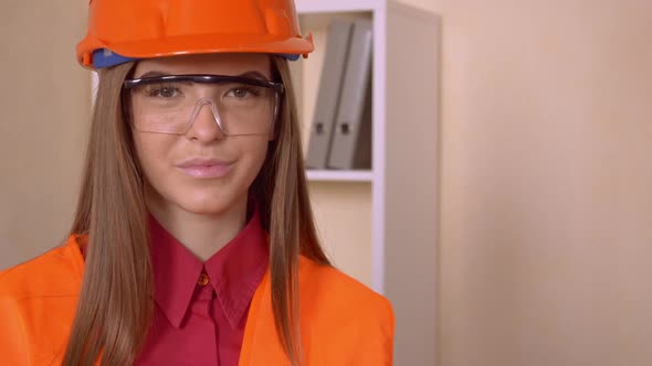 Happy Female Worker Architect in Uniform