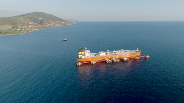 A gas tanker is anchored at sea aerial view 4 K